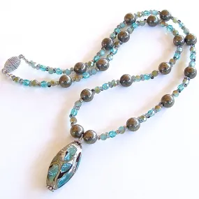 Iridium: 20" Teal Lampwork Pendant Necklace