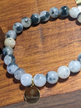 Mottled grey jade stretchy bracelet, golden Do Good charm.