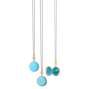 TURQUOISE ENAMEL AND VERMEIL ROUND LOCKET