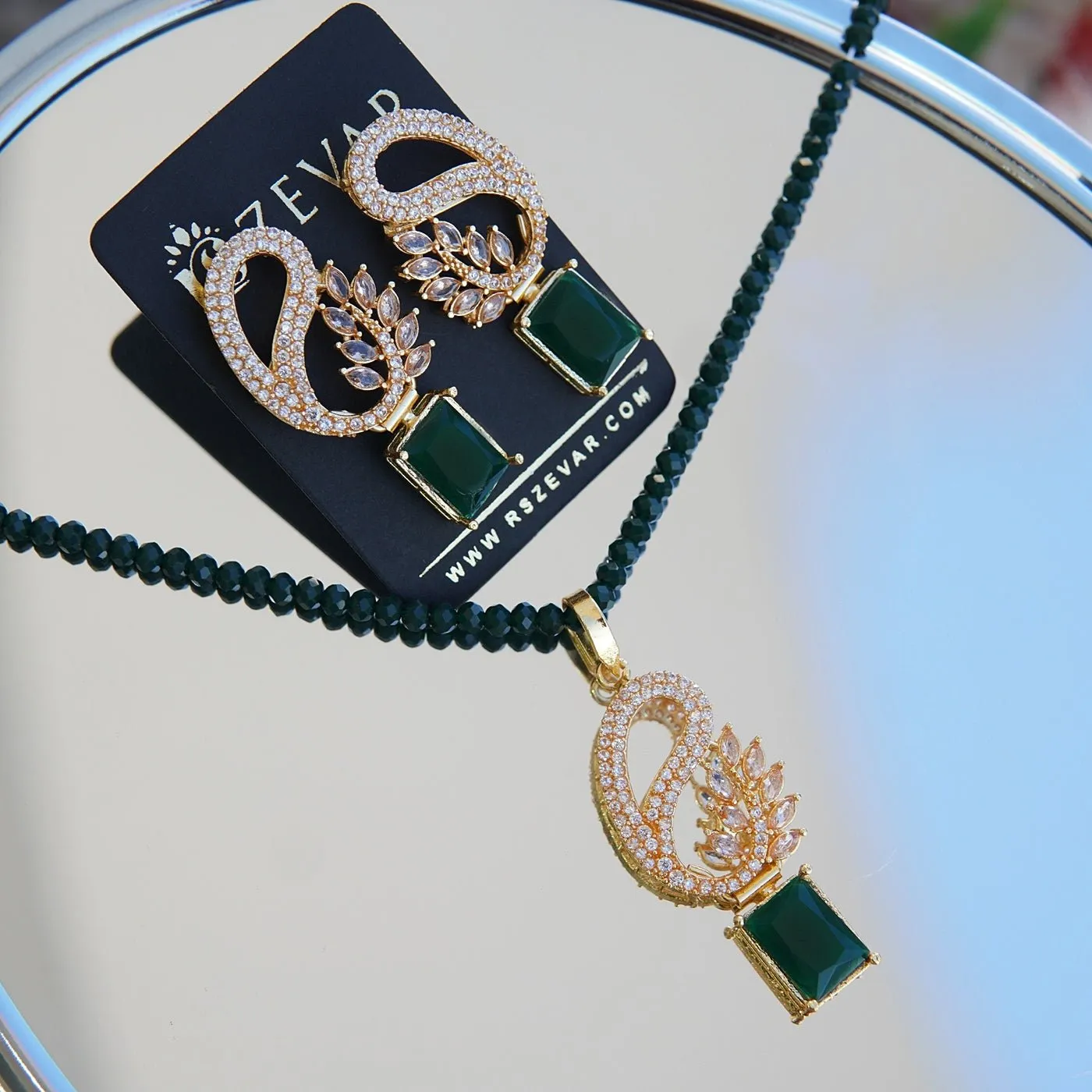 Zircones Golden Plated Locket Set